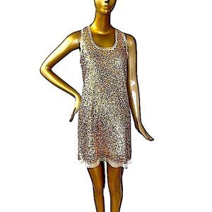 Beautiful dress White net, raw edge tank dress with gold sequins.